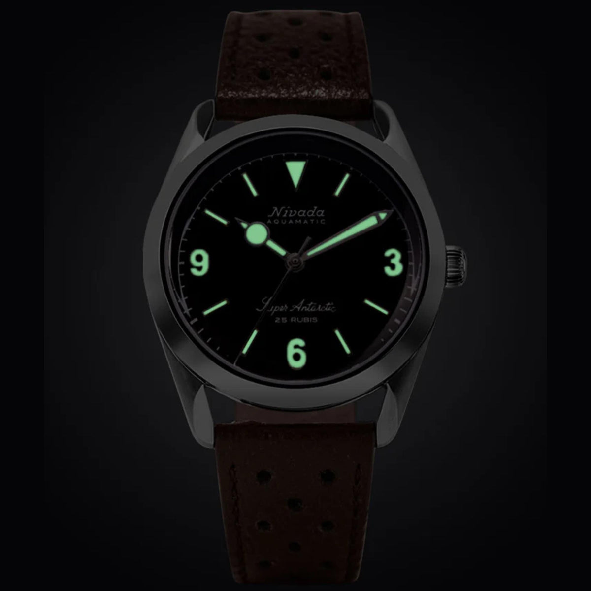 Nivada Grenchen Super Antarctic 32040A23 luminous dial hands and indices close up in the dark