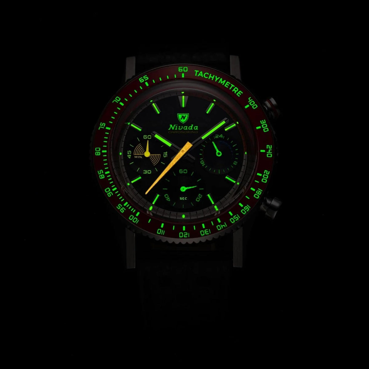 Nivada Grenchen Chronoking Mecaquartz 87049Q20 green luminous dial and bezel detail in the dark