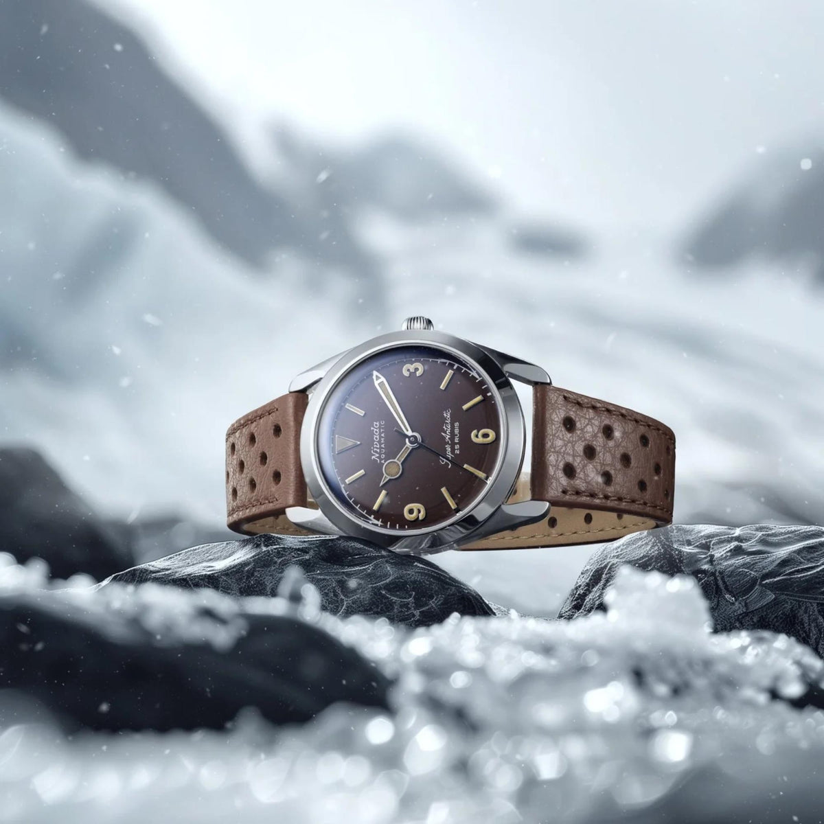 Nivada Grenchen Super Antarctic 32031A23 lifestyle shot resting on ice and dark rocks