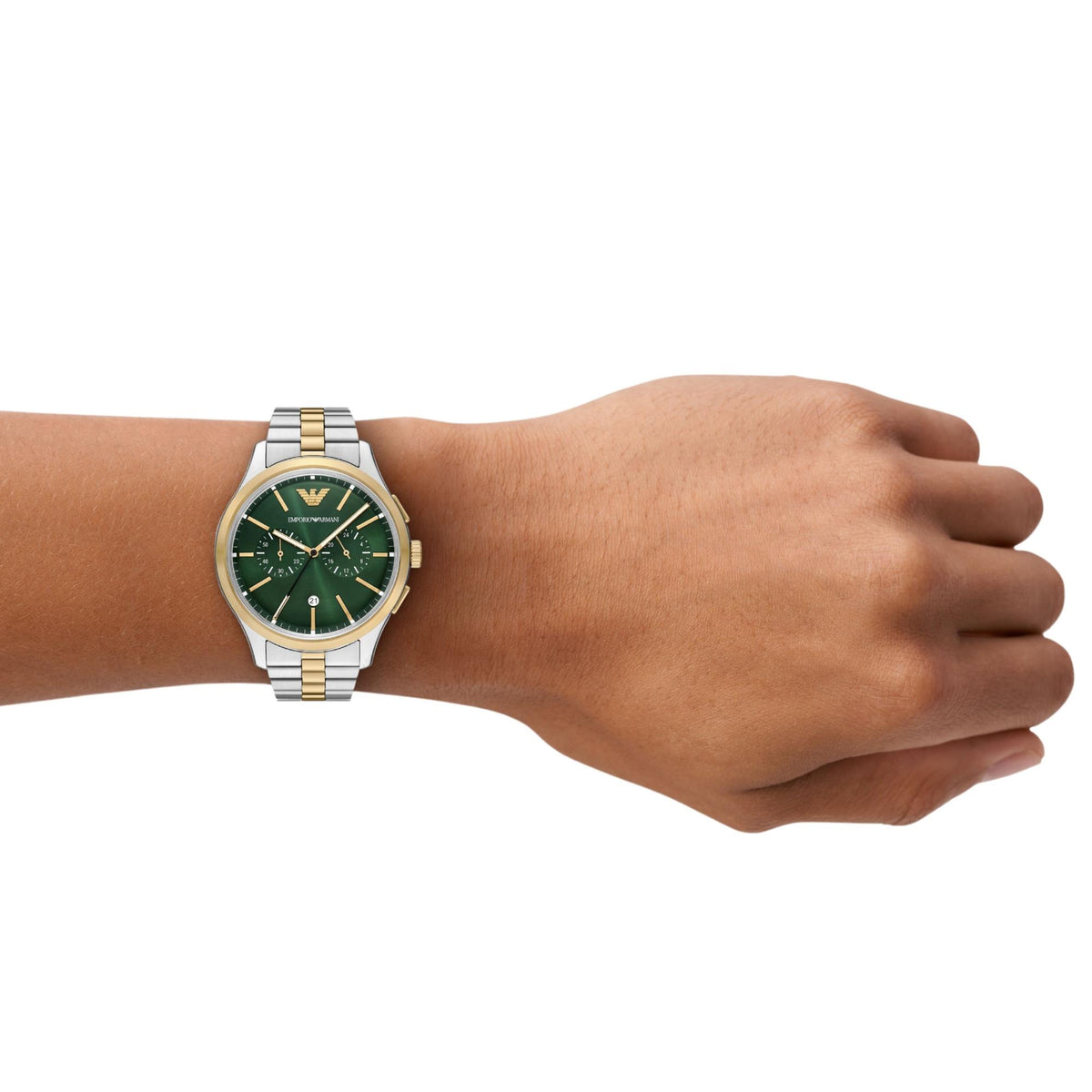 On-wrist shot of the Emporio Armani Dario AR11692 timepiece showcasing the round green dial and gold-tone accents on a wrist