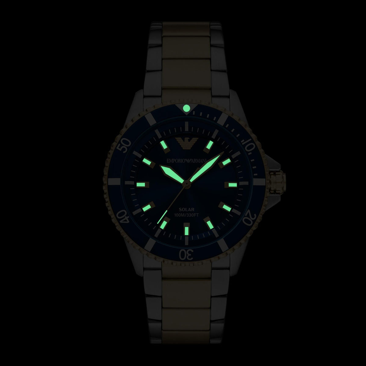 Dark view displaying the luminous hands and index hour markers on the Emporio Armani World Explorer AR11738 solar timepiece