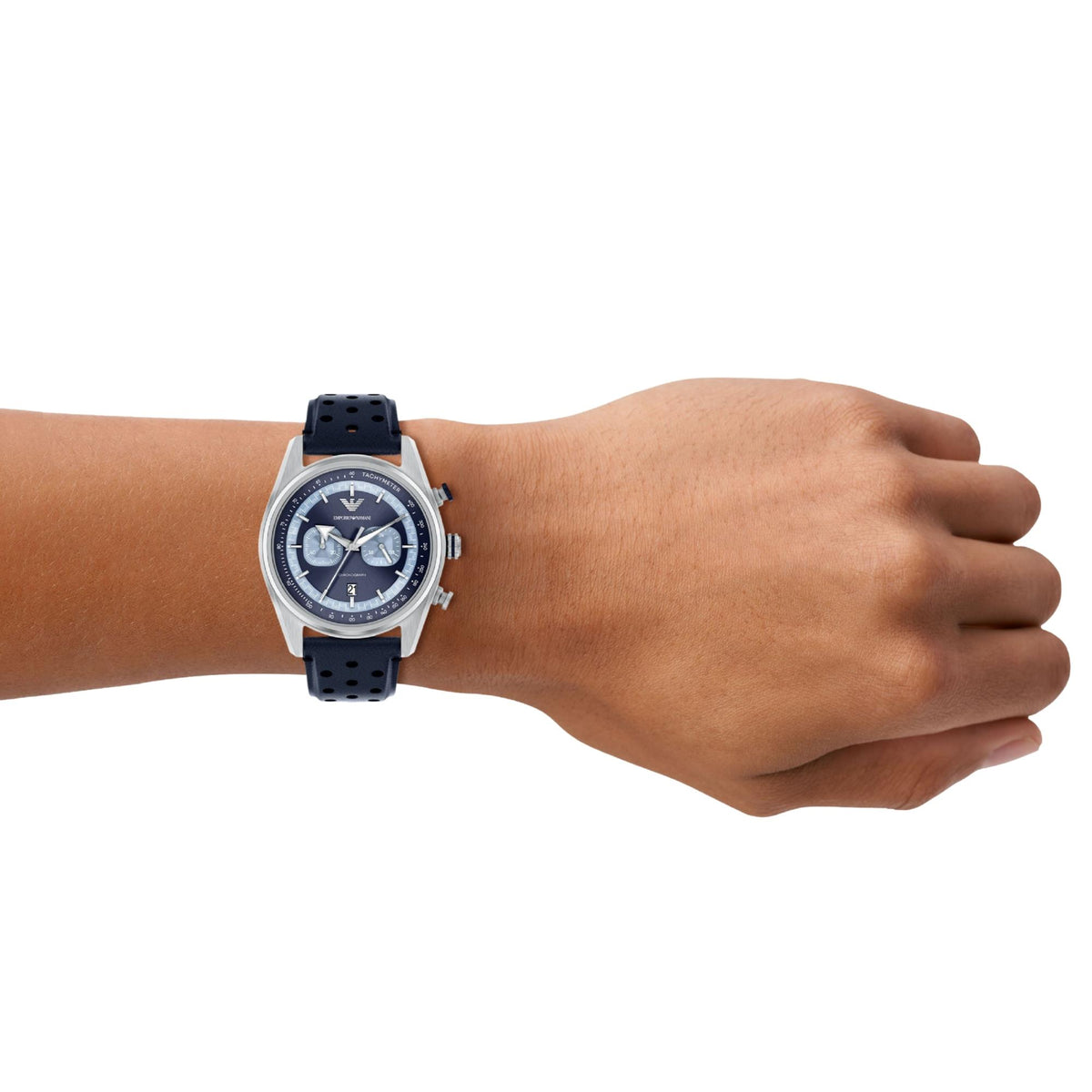 On-wrist perspective of the Emporio Armani Racer AR11781 timepiece displaying the blue dial, dual sub-registers, stainless steel case, and racing-style perforated blue leather band