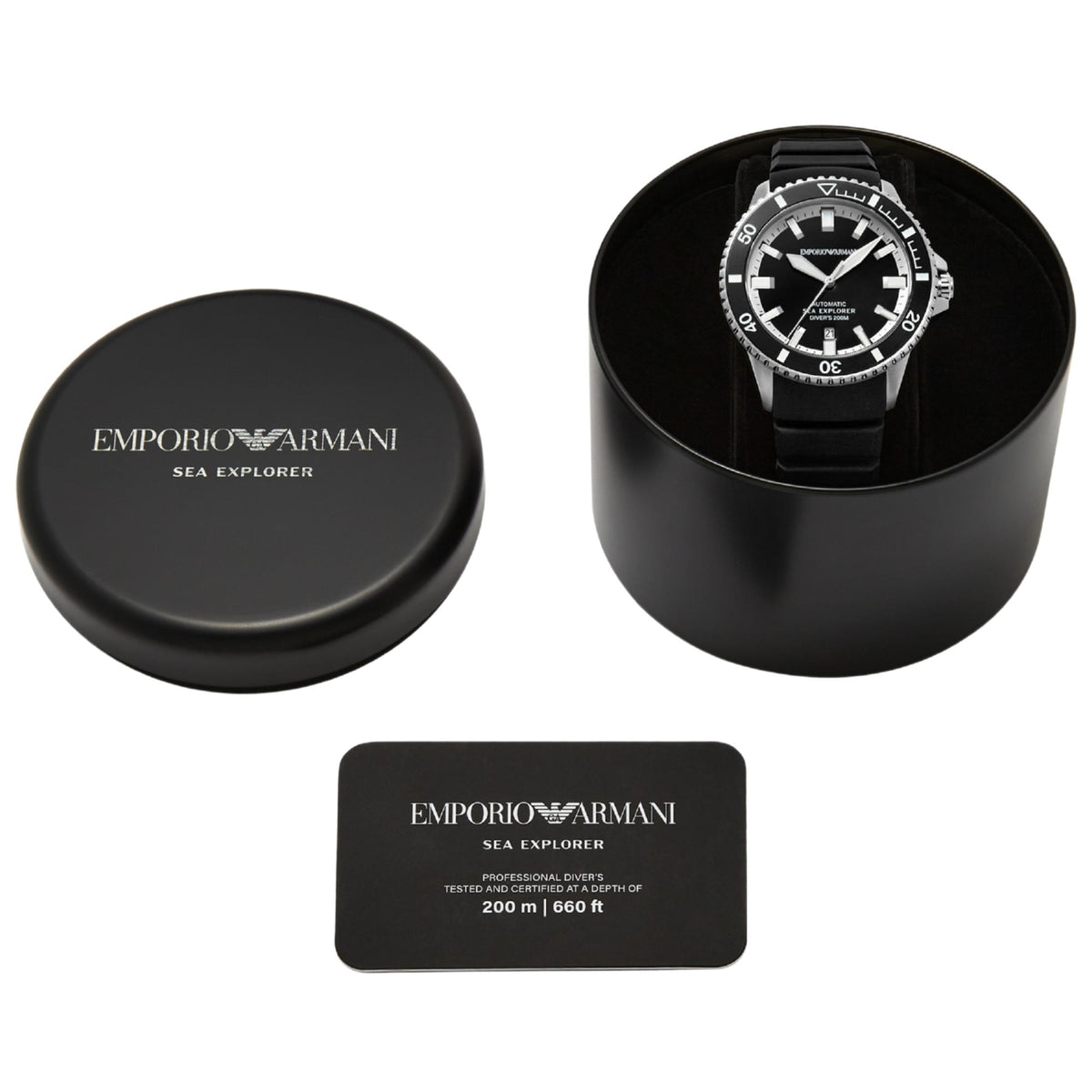Emporio Armani Sea Explorer watch stored in its opened black canister next to the brand card