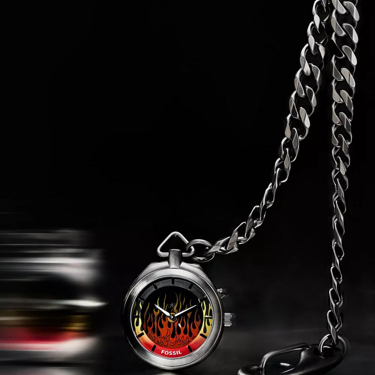 Fossil Y2K Big Tic LE1231 flame dial close up with dramatic studio lighting