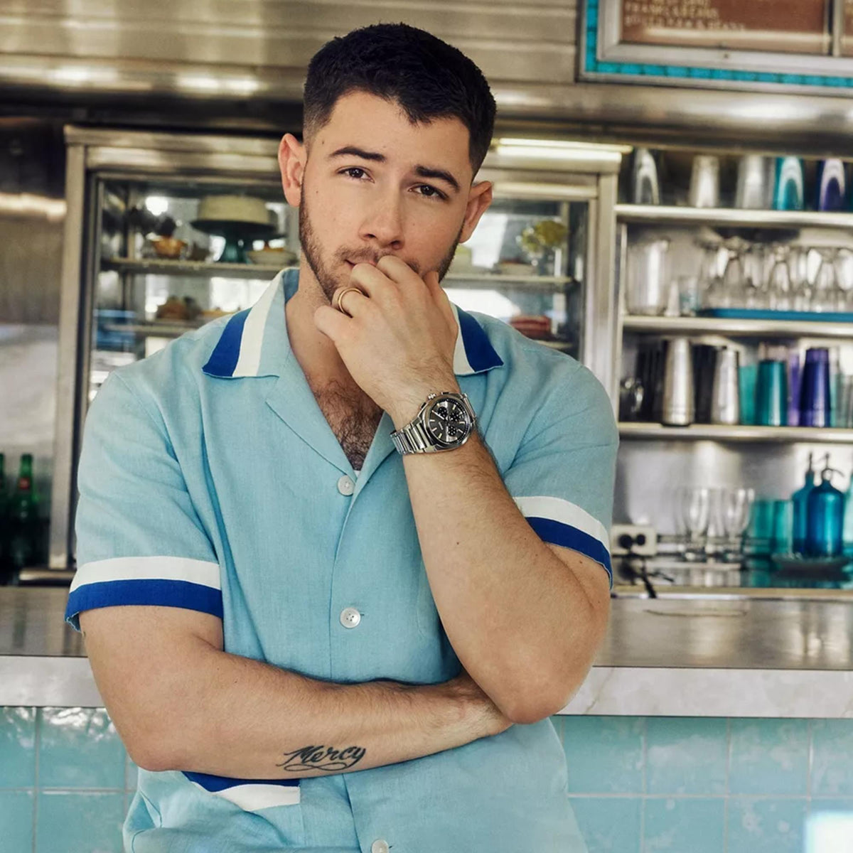 Fossil Everett FS6128 chronograph watch lifestyle view worn by Nick Jonas