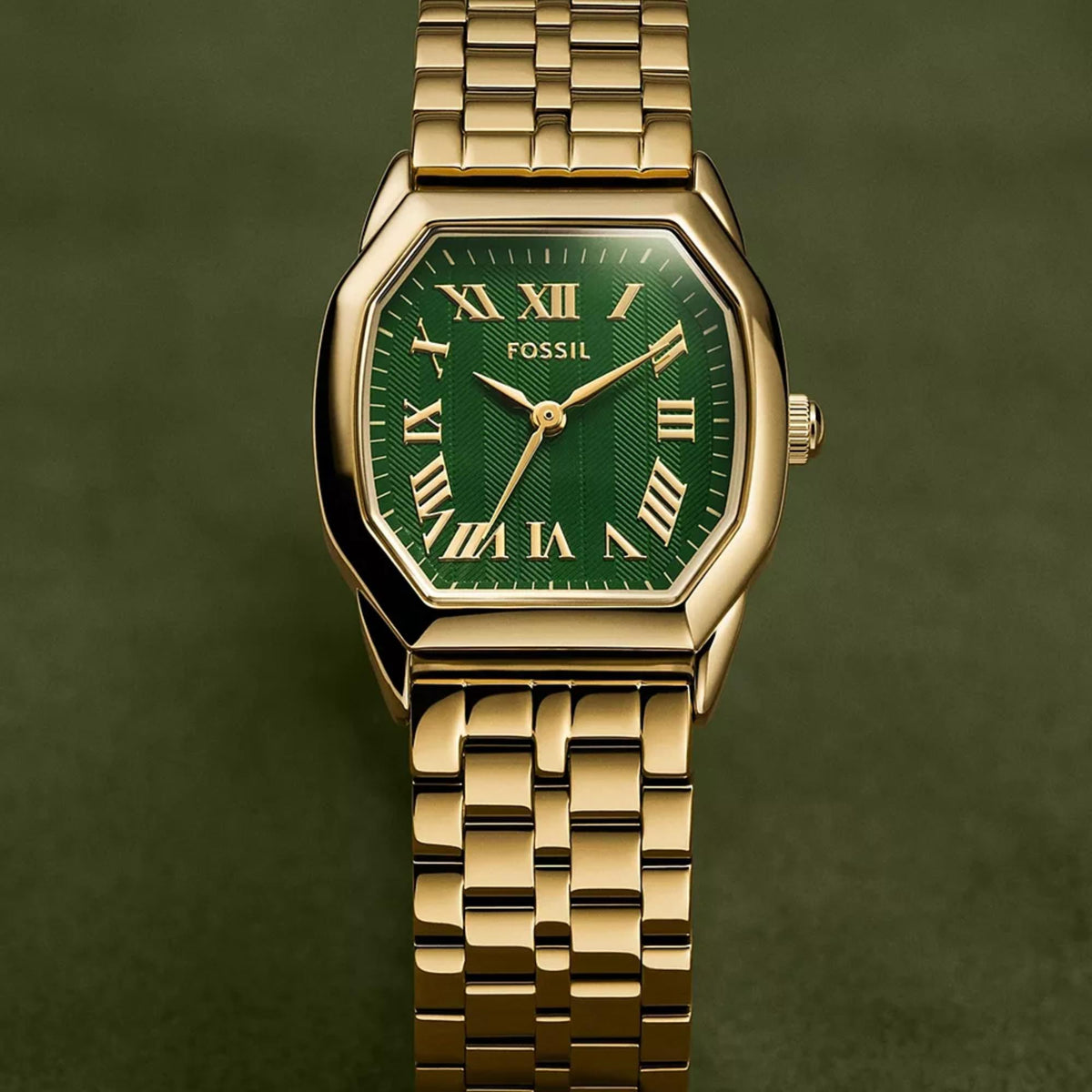 Close-up shot of the Fossil Harlow ES5451 watch face highlighting the green dial and gold-tone Roman numeral hour markers