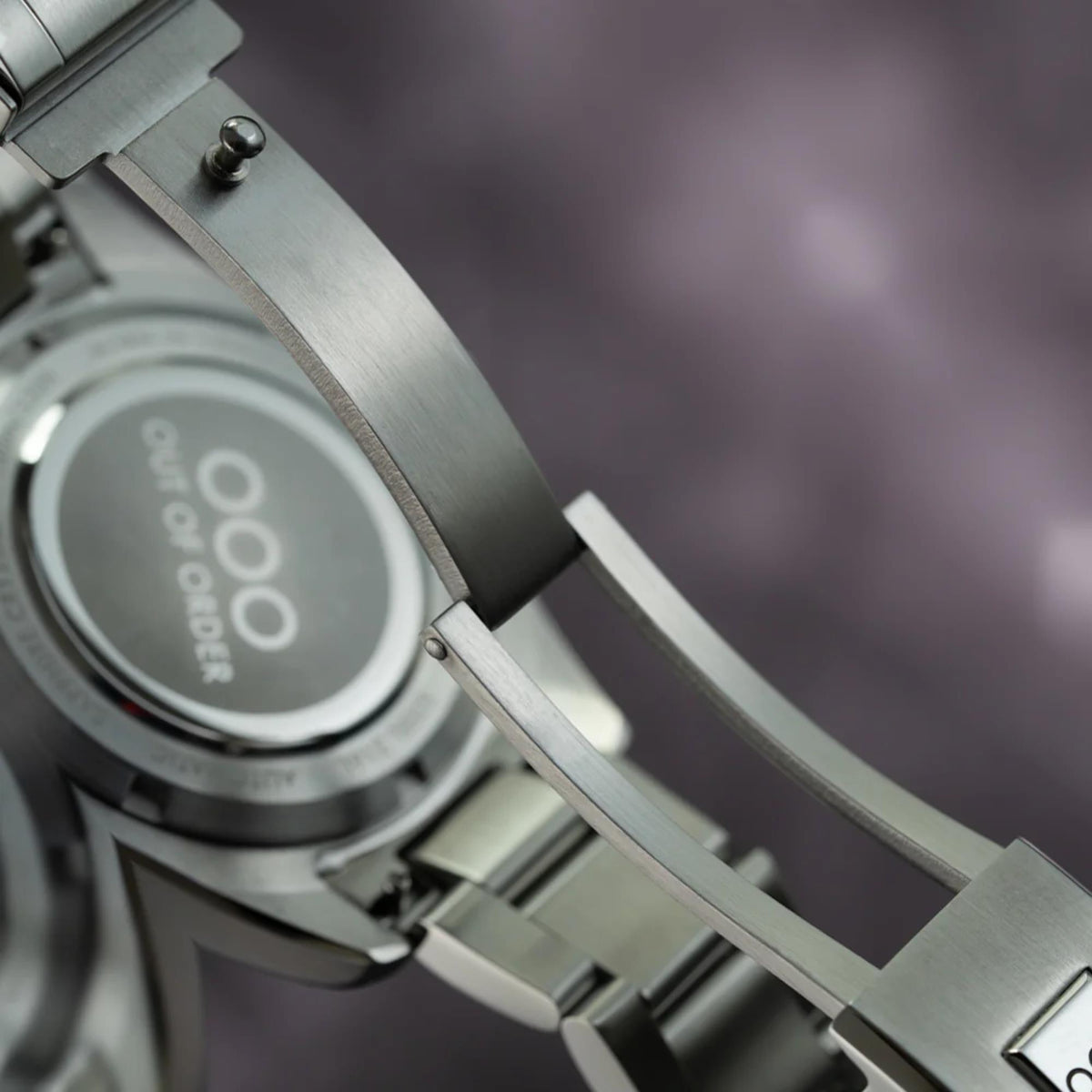 Men's steel automatic watch with blue mother-of-pearl dial and link bracelet