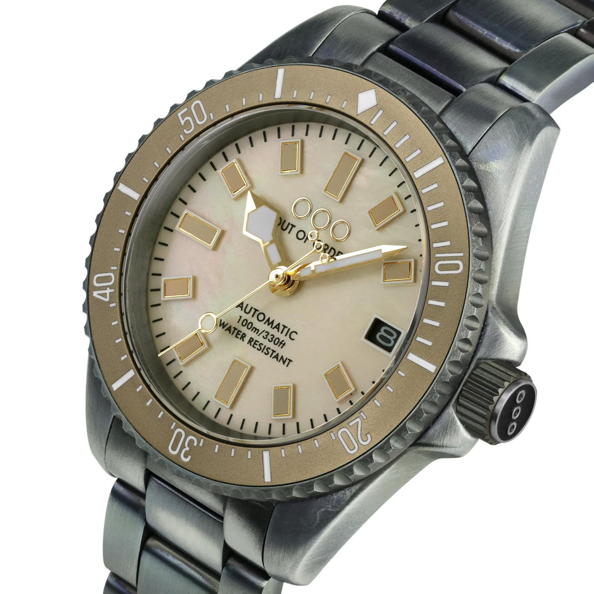 Men's automatic wristwatch close-up showing ivory dial, steel case, and crown at side