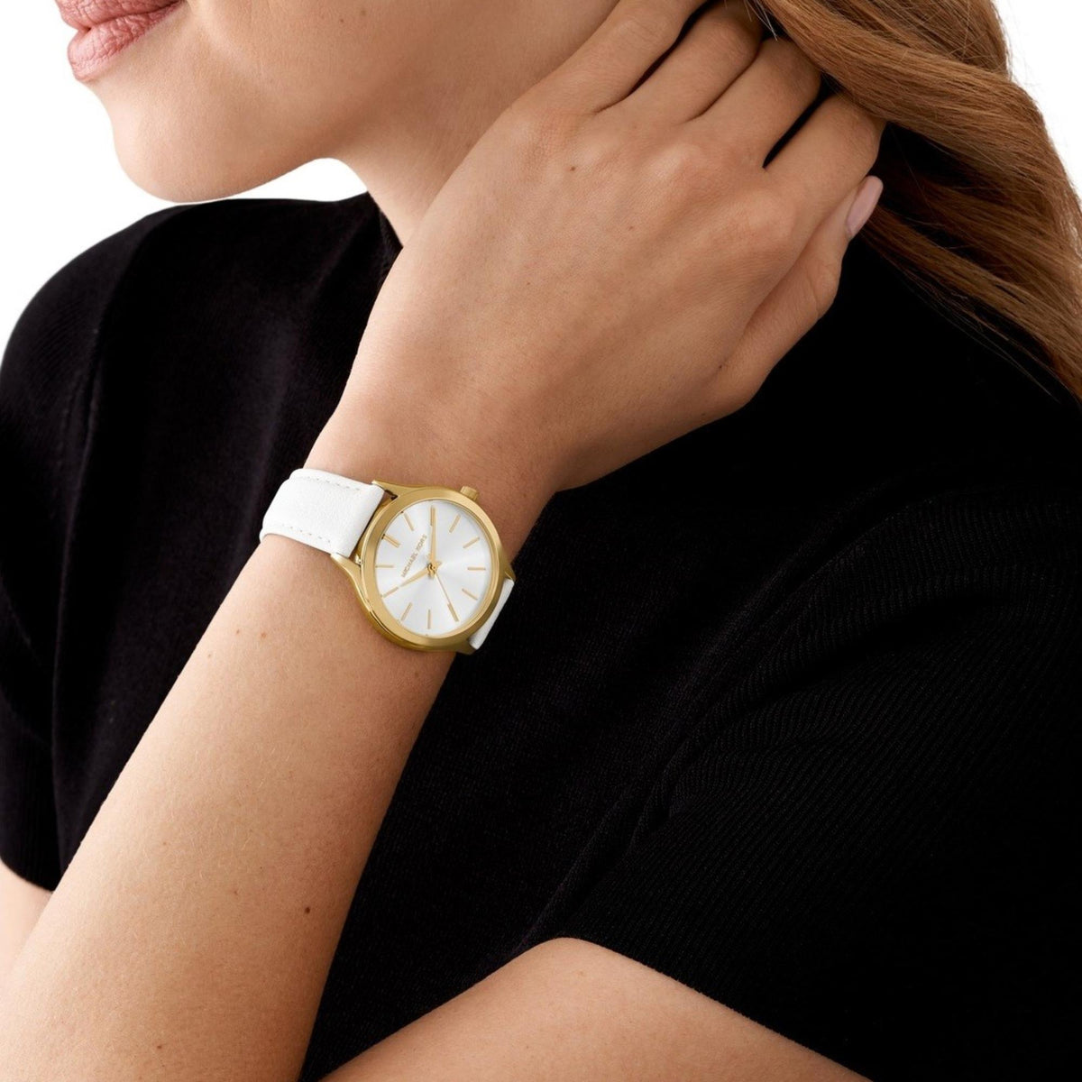 Michael Kors Slim Runway MK7544 white dial leather watch side view on wrist