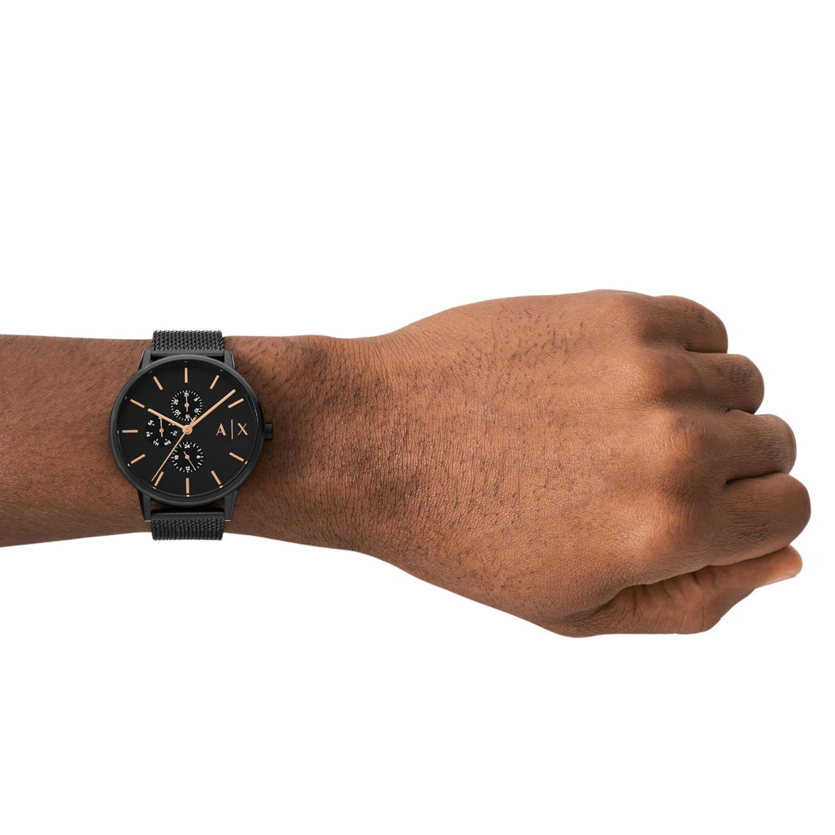 Men's black dial chronograph quartz watch with black mesh strap, on wrist