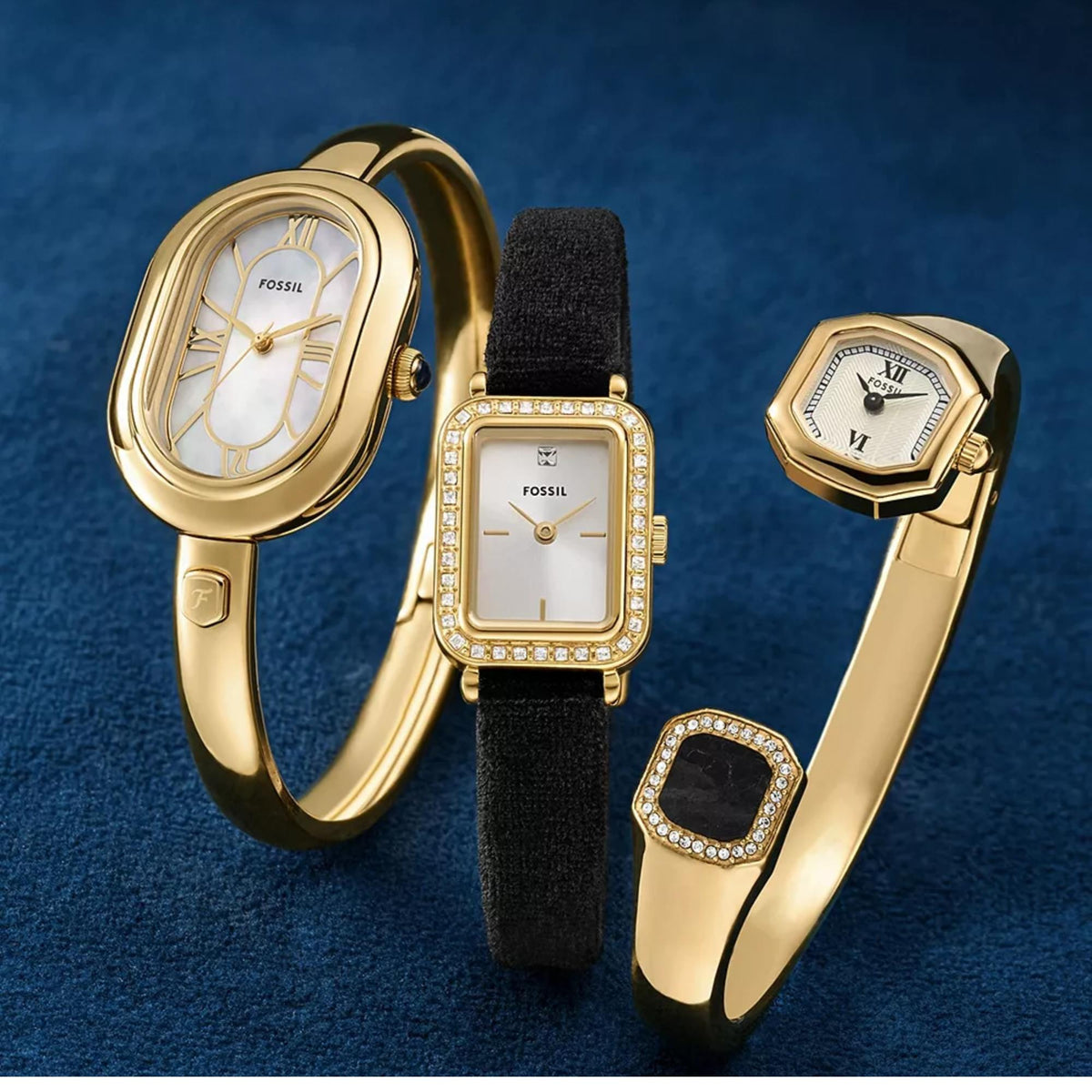 Fossil Sloan ES5444 three ladies watches collection group shot on blue background