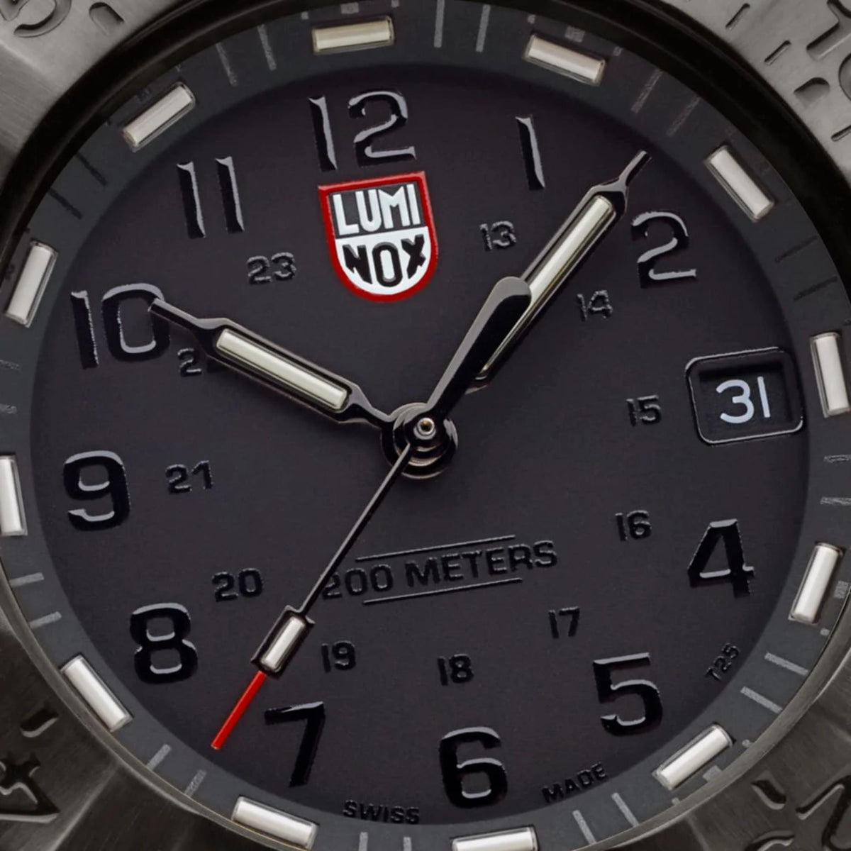 Detailed close-up of dark dial, date display, and red-tipped second hand on Luminox Navy SEAL Foundation XS.3228.NSF