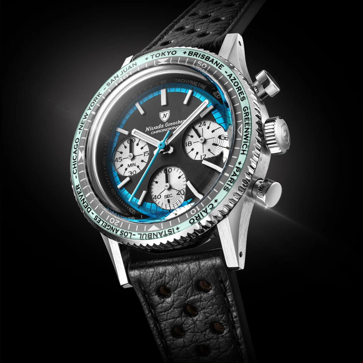 Nivada Grenchen Chronoking Chronograph with a stainless steel case, a black dial with white subdials and hands, a bright blue inner ring, and a tachymeter bezel printed with city names