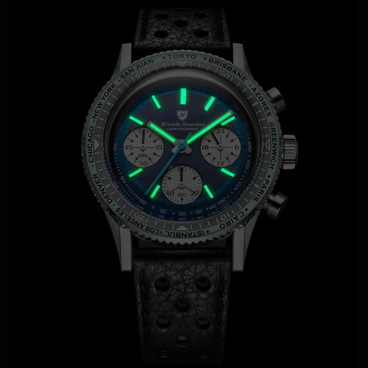 Nivada Grenchen Chronoking watch 87054Q10 with a leather strap and a blue dial, featuring glowing green luminescent hands and markers