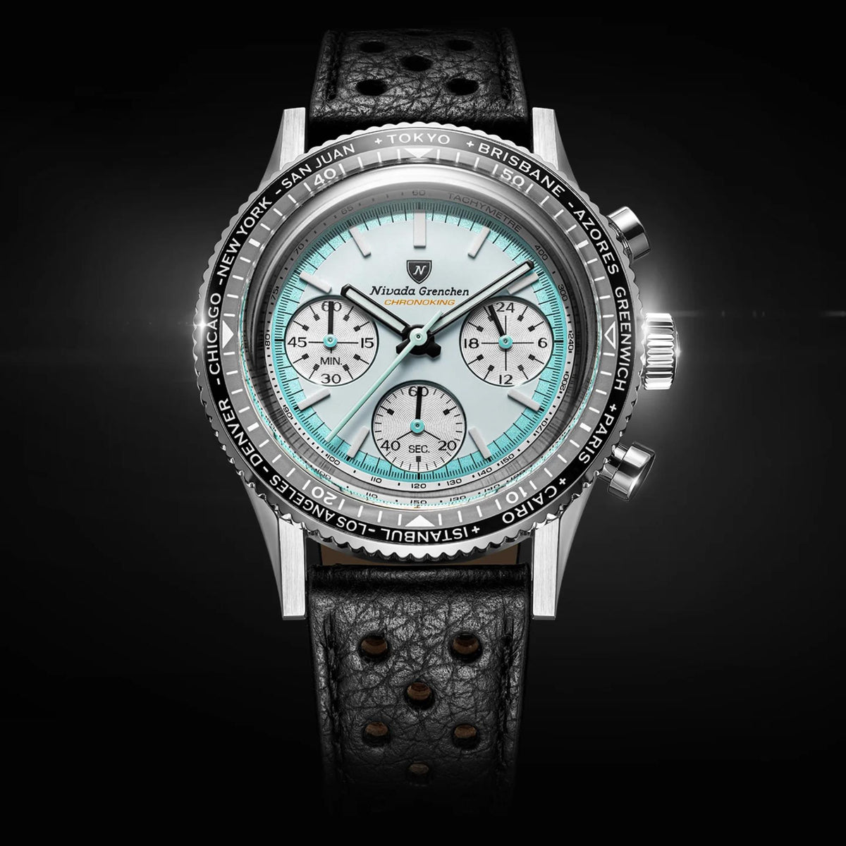 Nivada Grenchen Chronoking watch 87056Q10 with a stainless steel case, a black textured leather strap, and a white dial with white subdials and a black rotating bezel marked with world city names