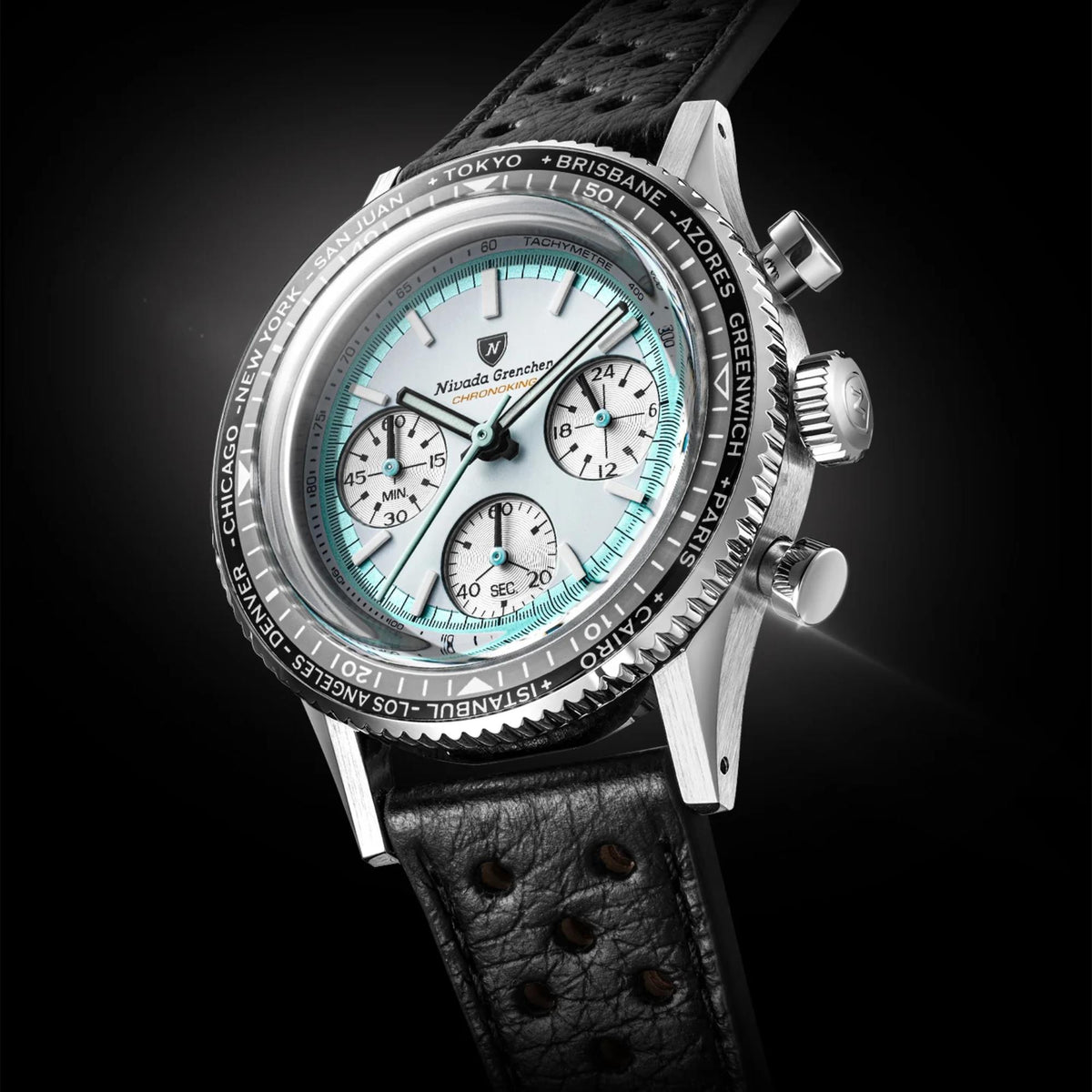 Nivada Grenchen Chronoking watch 87056Q10 with a silver-tone stainless steel case, a black leather strap, and a white dial with its subdials and a tachymeter bezel