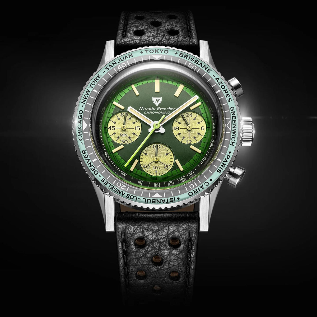 Nivada Grenchen Chronoking watch with a green dial, black leather racing strap, and a tachymeter bezel against a black background