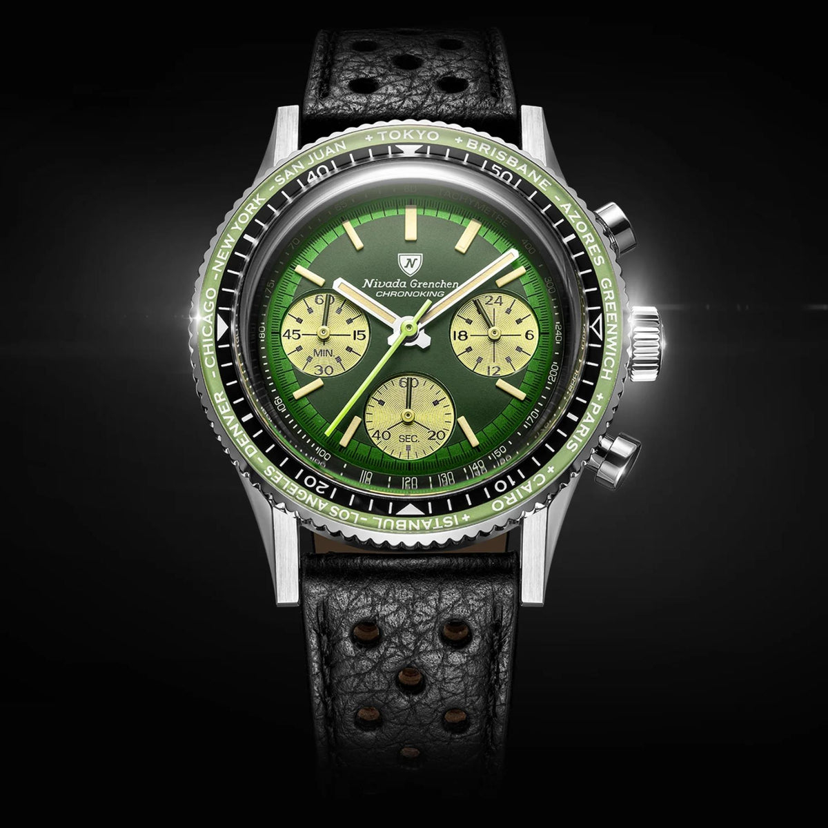Nivada Grenchen Chronoking watch with a green dial, black leather racing strap, and a green world-time city bezel against a black background