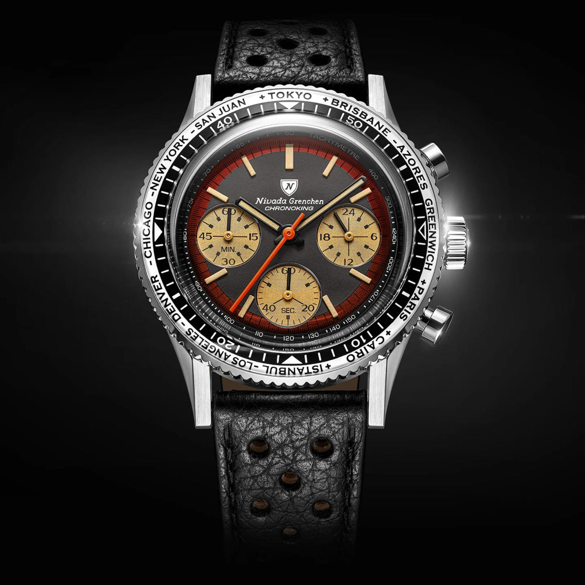 A Nivada Grenchen Chronoking watch featuring a black-and-silver city bezel and subdials is showcased against a dark background