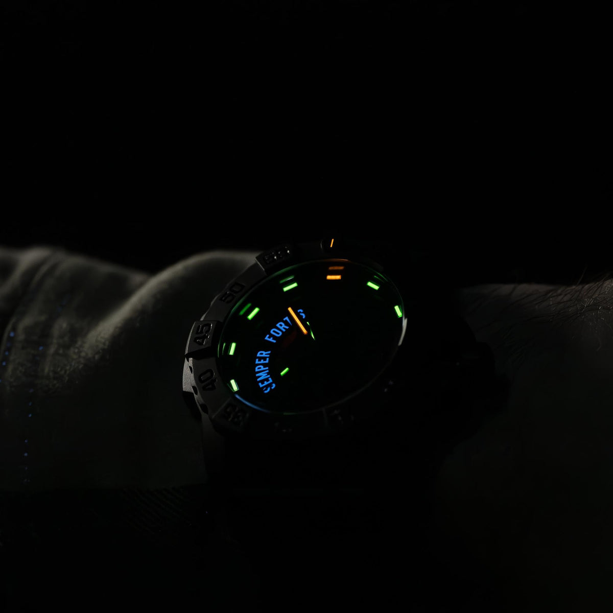 Luminox Navy SEAL XS.3515.N wrist view displaying illuminated dial display in low light setting