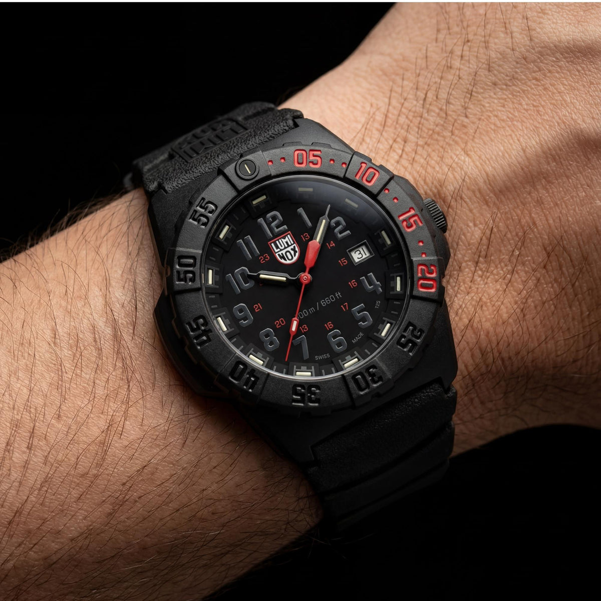 Luminox Navy SEAL 3550 Series XS.3565 wrist shot displaying mens quartz watch with black case and rubber strap