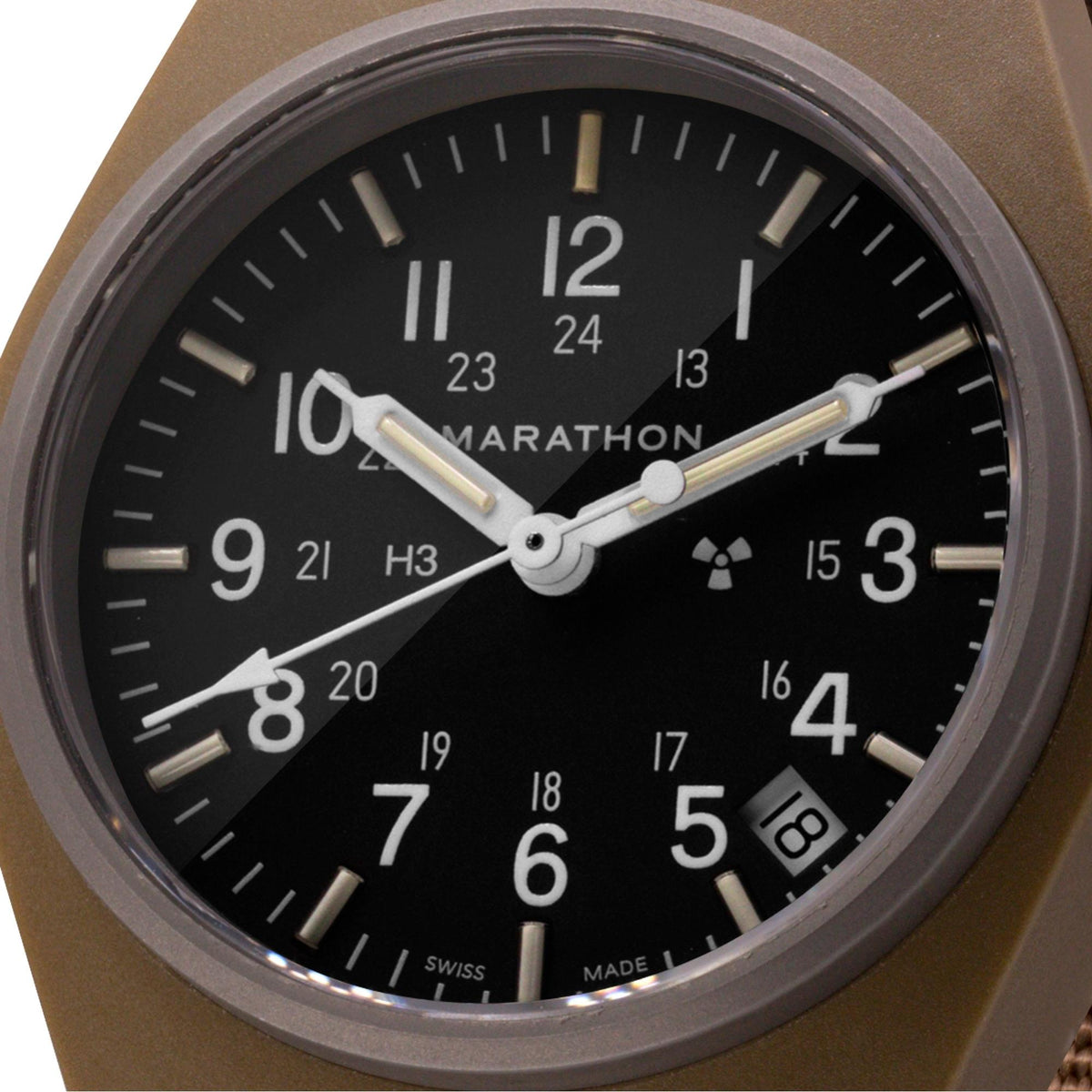 Marathon General Purpose Field WW194015DT-0103 quartz watch macro shot showing black dial with 24-hour markings and date window