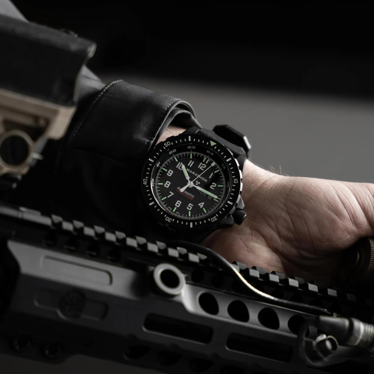 Marathon JDD Anthracite WW194021BK-0130 automatic watch displayed on wrist, showing black steel case and black dial