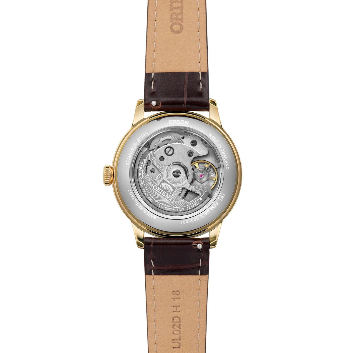 Orient Bambino RA-BB0101S30B showing its exhibition caseback and brown leather strap from the back