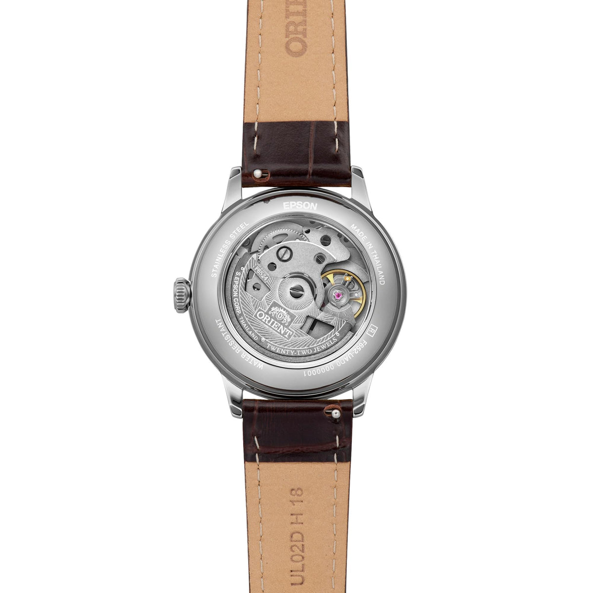 Orient Bambino RA-BB0104Y30B showcasing its exhibition caseback, revealing its automatic movement and brown leather strap inner lining