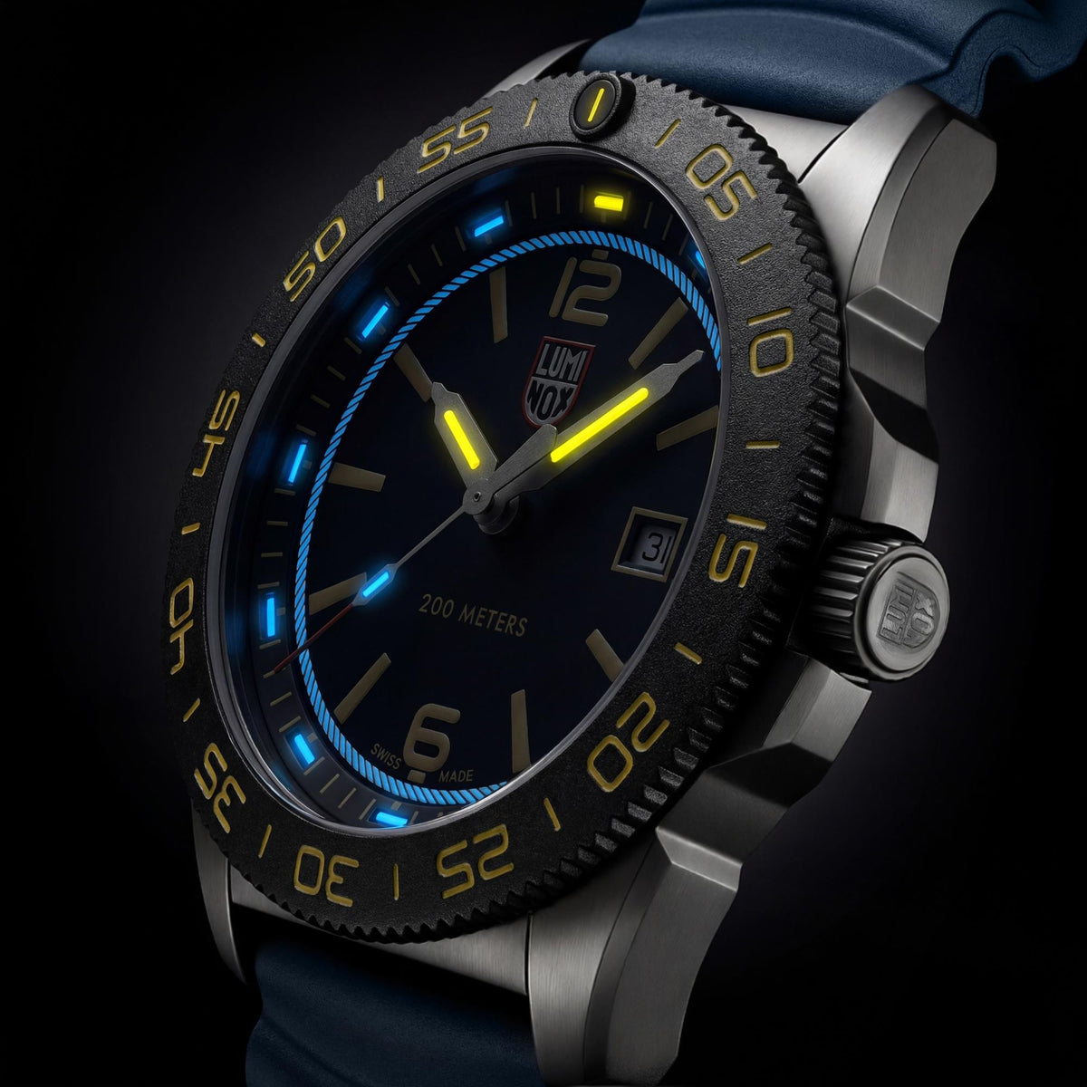 Side angle of the Luminox Pacific Diver FORCE BLUE 3120 Series XS.3125.FB watch showcasing glowing night-vision tubes