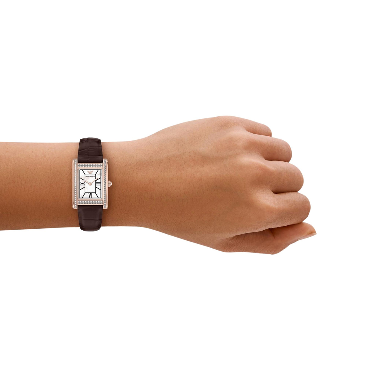 Emporio Armani Genni AR11804 timepiece displayed on a wrist, showcasing the 22.5mm rectangular rose gold-tone case, mother of pearl dial, and slim brown leather band