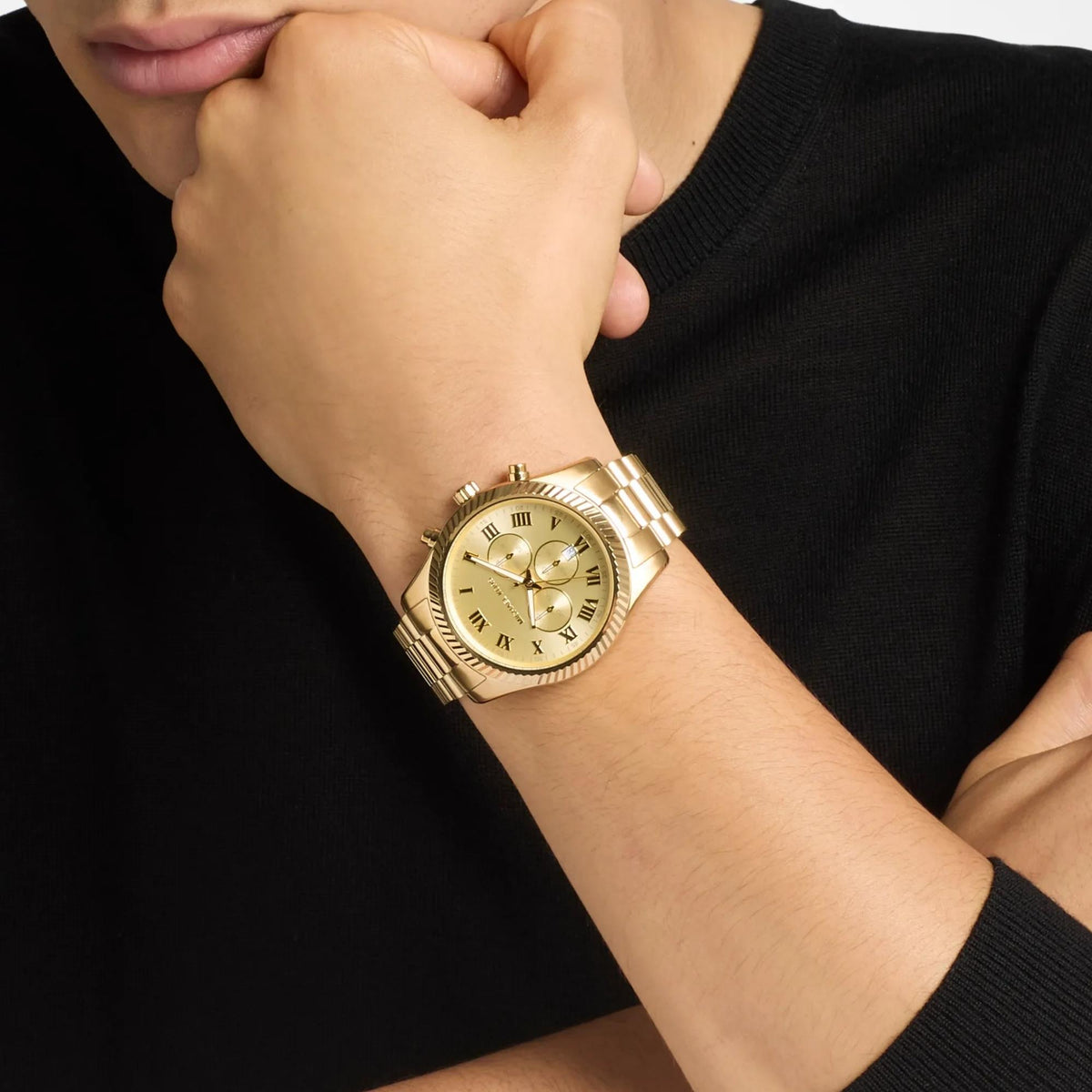 Michael Kors Lexington 45mm MK9276 men's quartz watch wrist shot view displaying the large gold-tone chronograph timepiece worn on the wrist