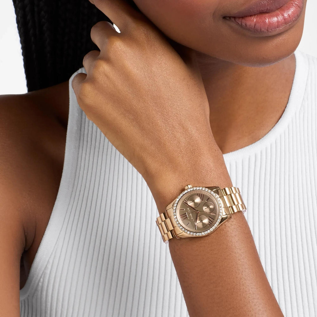 Michael Kors Lexington MK7631 ladies quartz watch model shot view displaying the crystal-embellished timepiece worn on the wrist