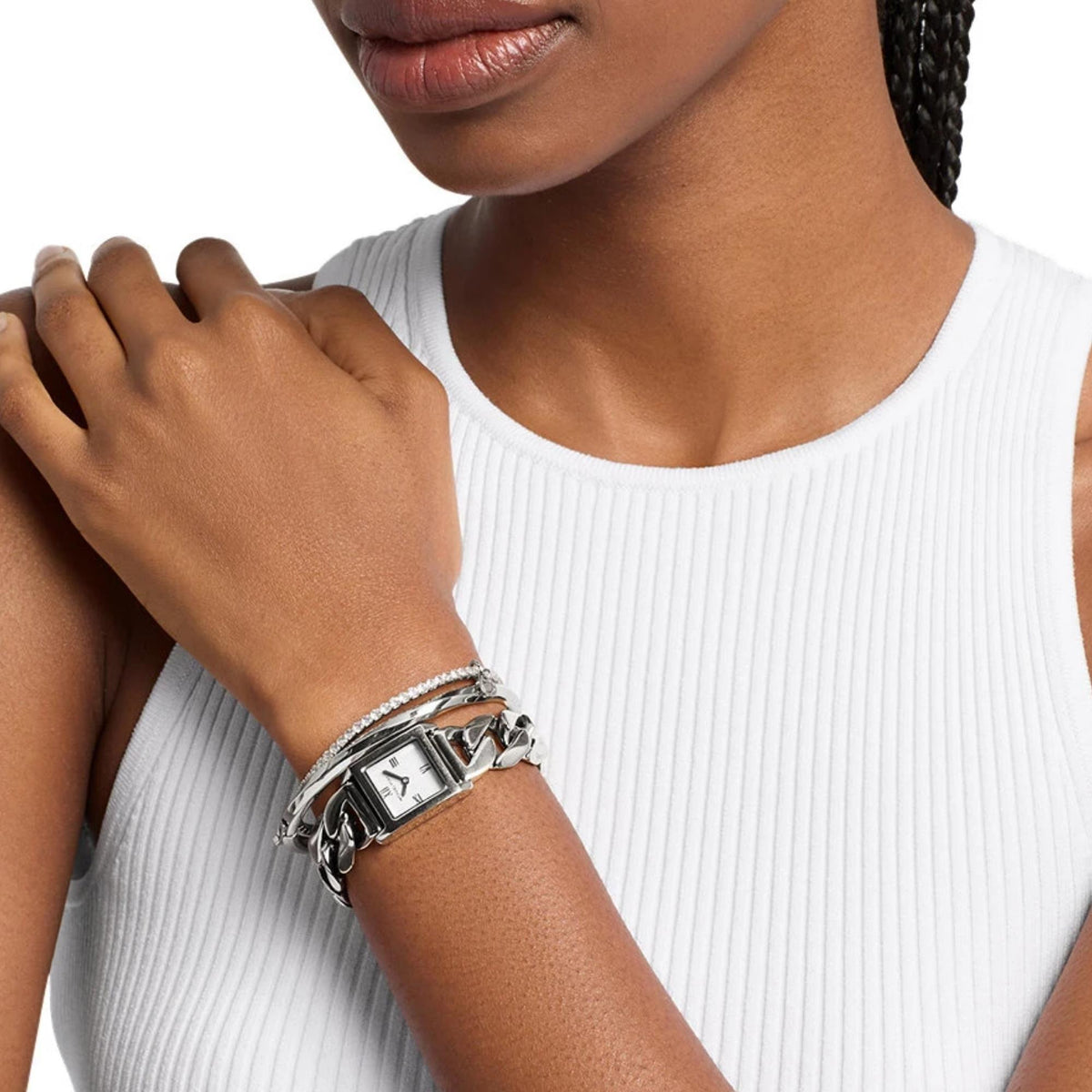 Michael Kors Georgie 19mm Silver Dial MK7657SET womens quartz watch wrist shot displaying the chain link watch and matching silver bangles stacked together