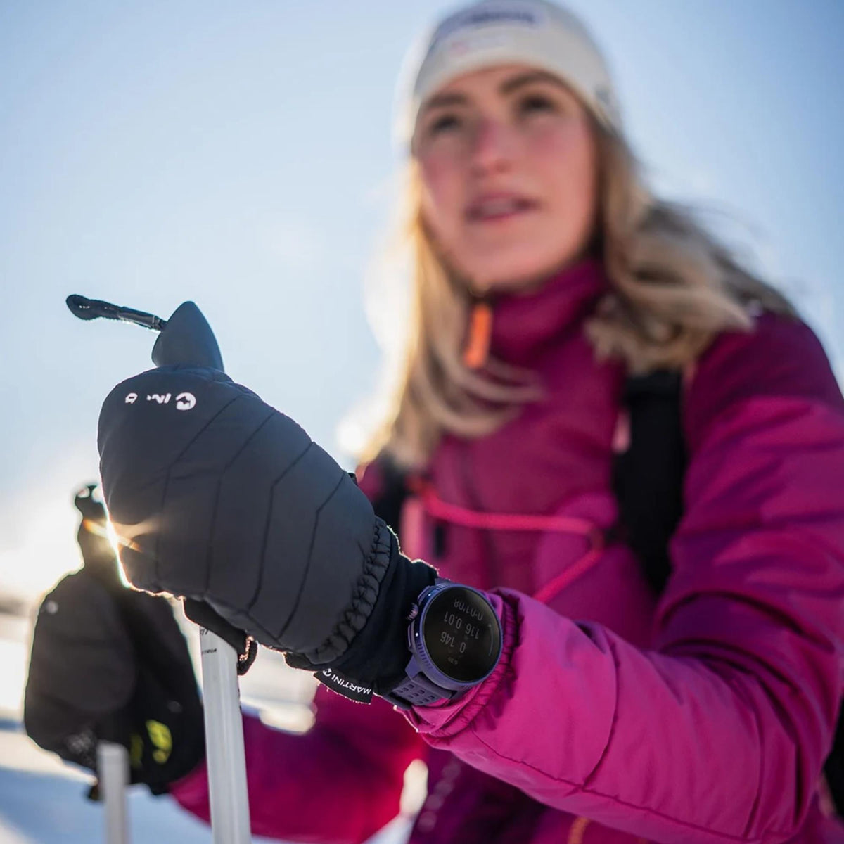 Suunto Race SS050933000 action shot worn over activewear during skiing activity