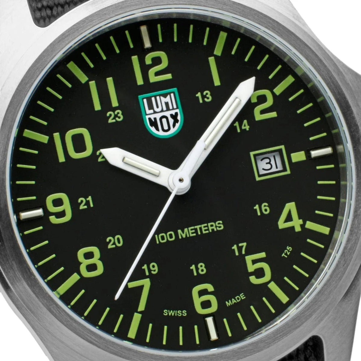 A close-up of the black dial of the Luminox G-Collection 'Moon Valley' 2500 Series X2.2517 watch, showing the light green numerals, hands, and the date window