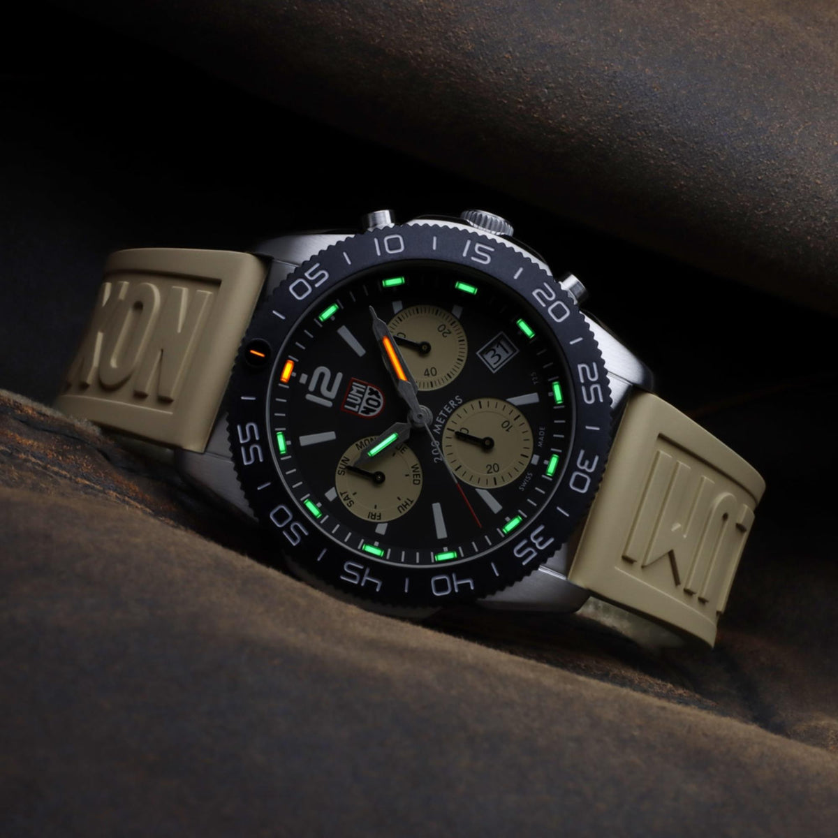 Luminox Pacific Diver 3140 Series XS.3150 mens chronograph watch angled view displaying illuminated night display on black dial