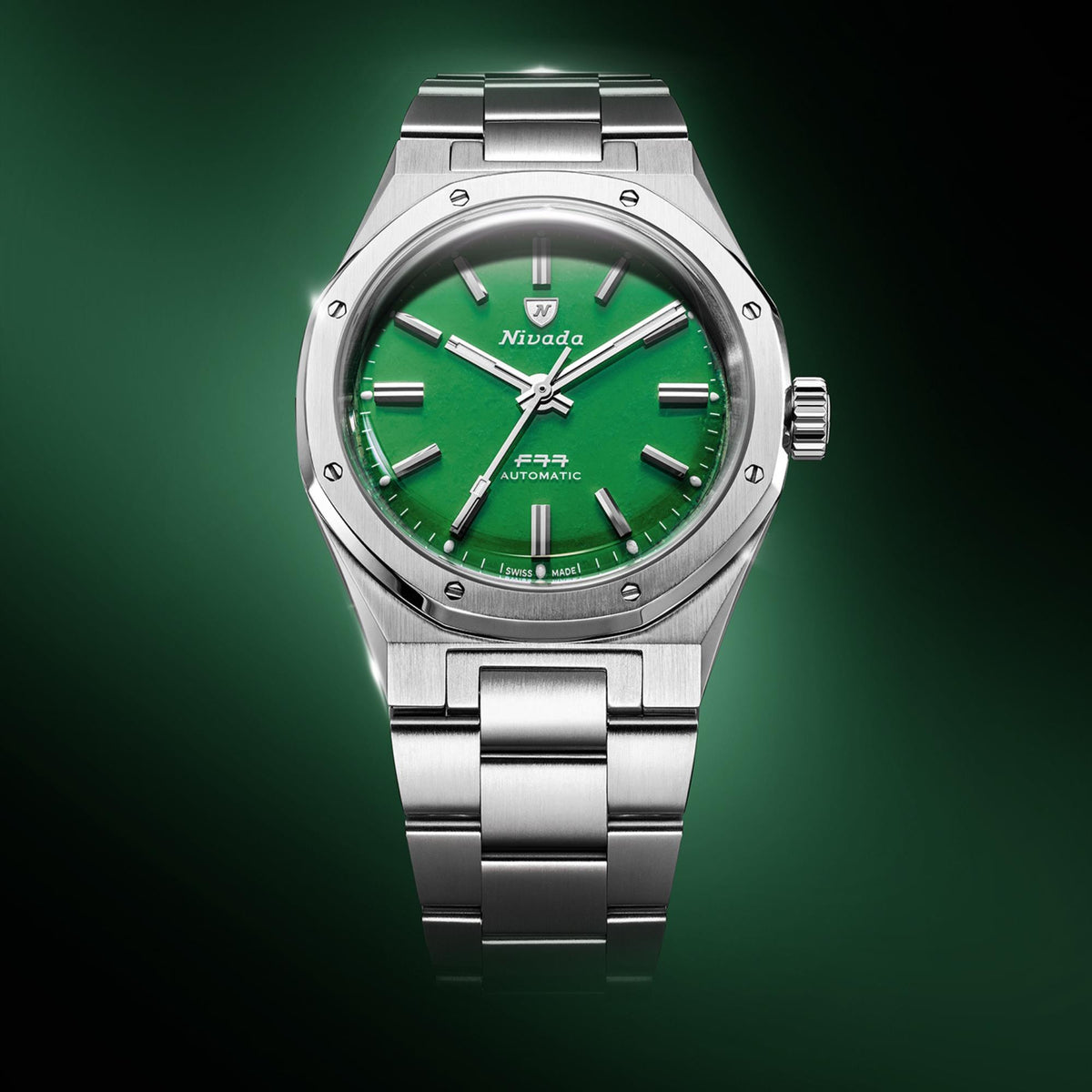 Nivada Grenchen F77 68055A77 straight-on view of green jade dial against studio dark backdrop