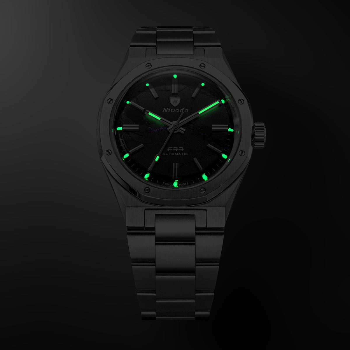Nivada Grenchen F77 68058A77 dark view displaying luminous hands and indices on shungite black dial