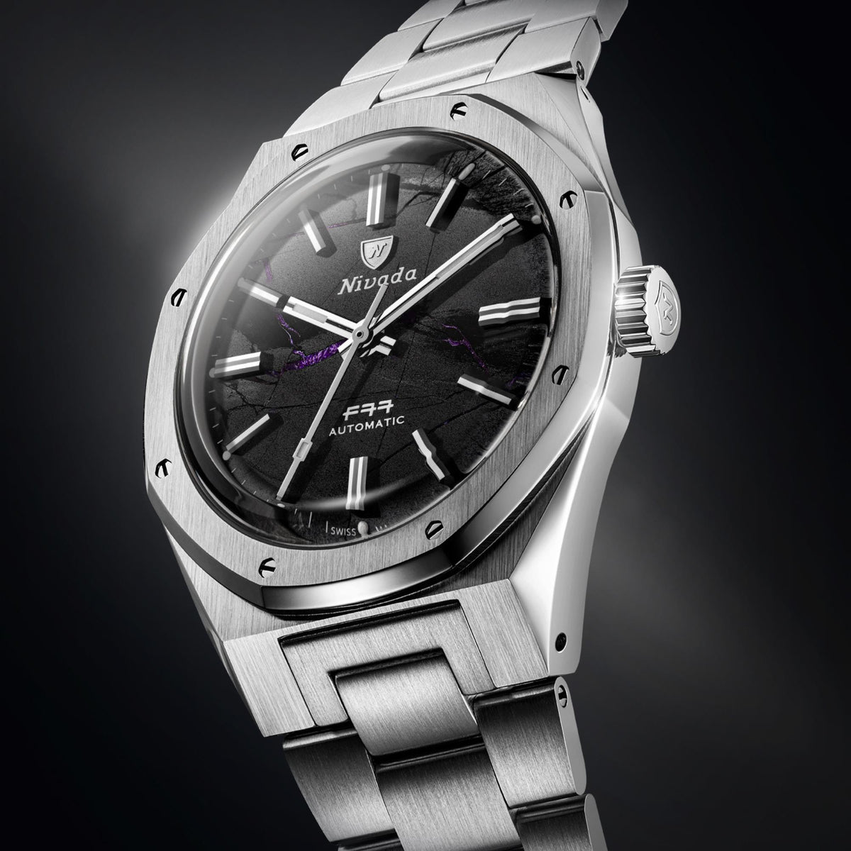 Nivada Grenchen F77 68058A77 angled perspective showing steel case architecture and shungite black dial texture