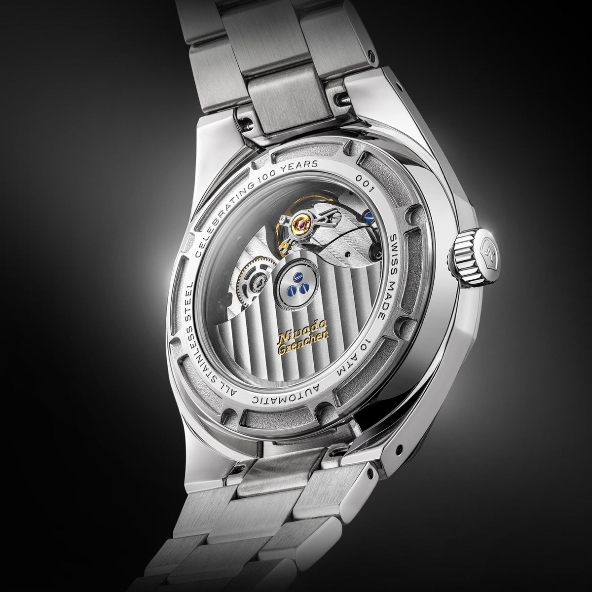 Nivada Grenchen F77 MK2 68062A77 close-up back view showcasing decorated automatic rotor and sapphire case back