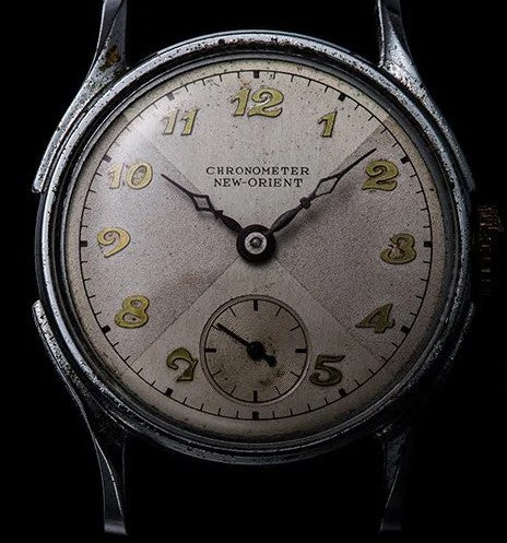 Vintage Chronometer New-Orient mechanical watch featuring an aged patinated dial and sub-seconds display