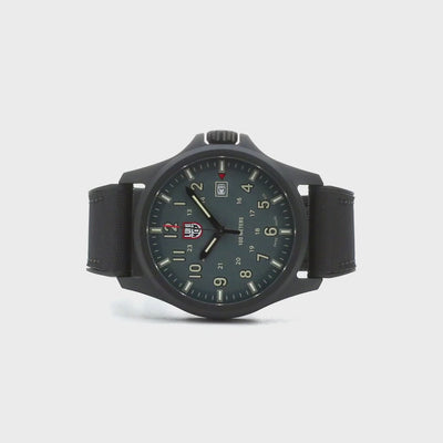 Luminox Atacama Field XL.1977 quartz timepiece with a black case, olive green dial display, and matching black wristband