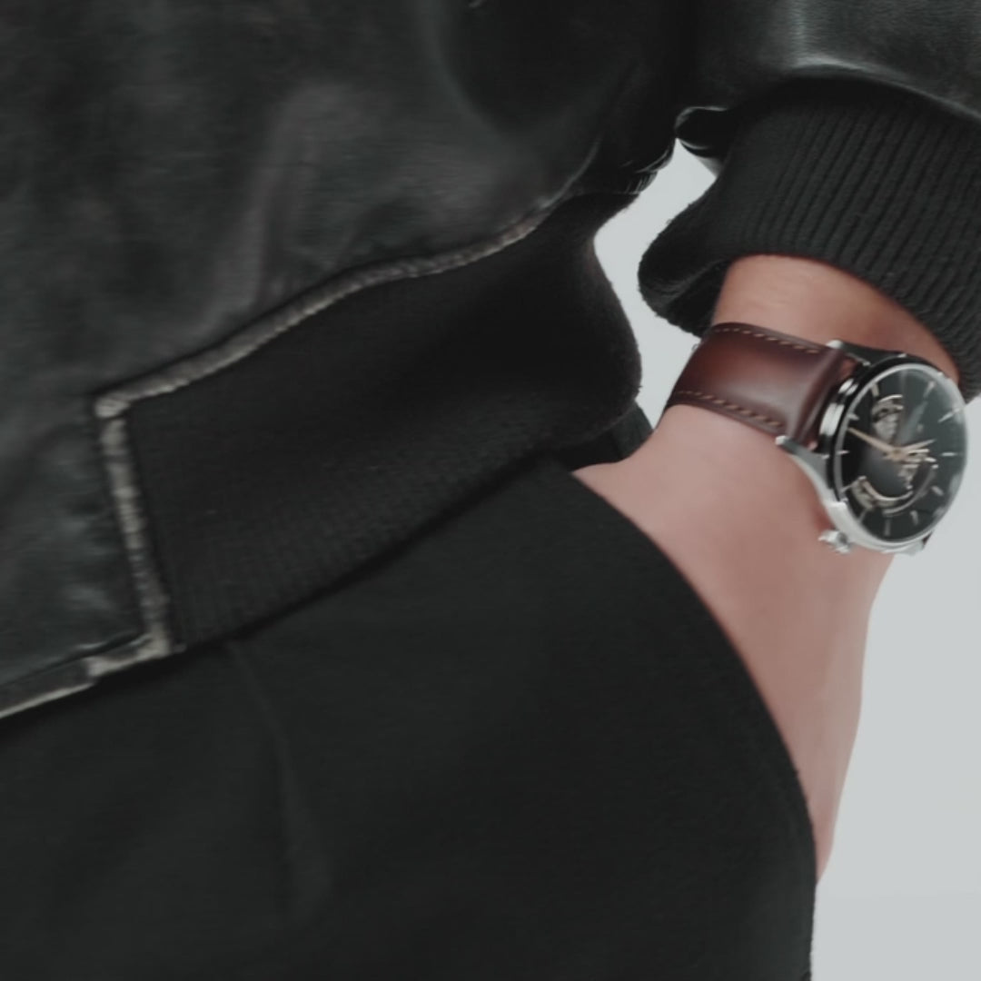 Hamilton Jazzmaster H32705501 42mm automatic watch direct wrist view paired with black trousers showing brown dial