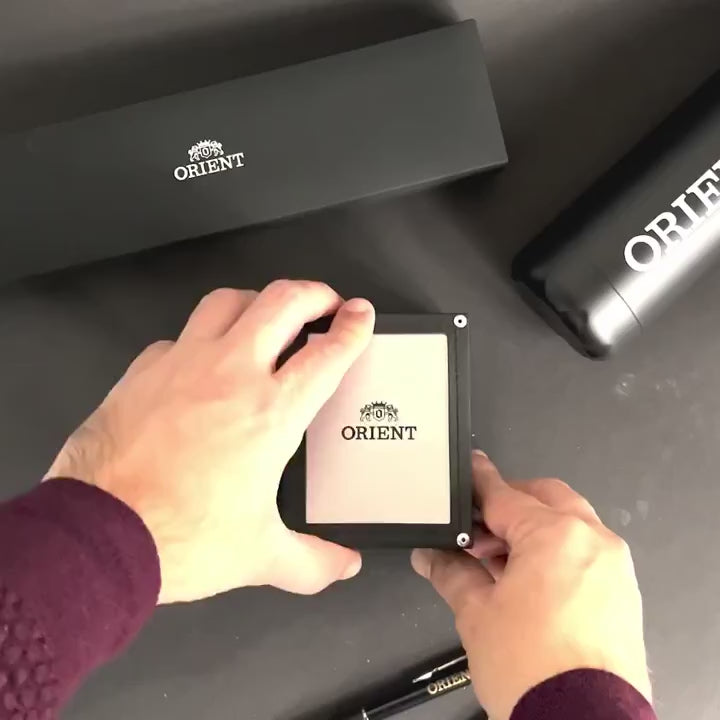 Unboxing view of the presentation packaging set for the Orient Multi-Year Calendar RA-BA0002E30B mens watch