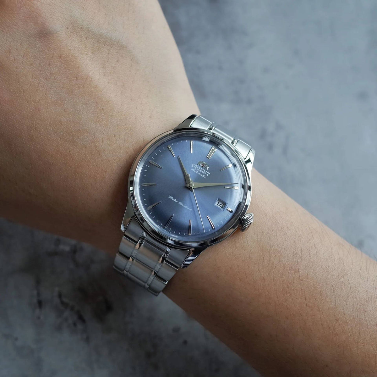Orient Bambino RA-AC0M10L30B automatic dress watch worn on wrist
