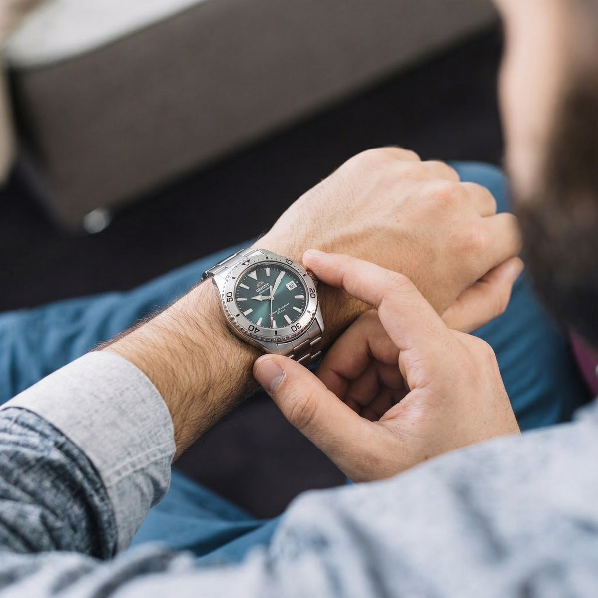 Orient Mako 40mm RA-AC0Q13E30B mens wristwatch featuring a green dial worn on the wrist