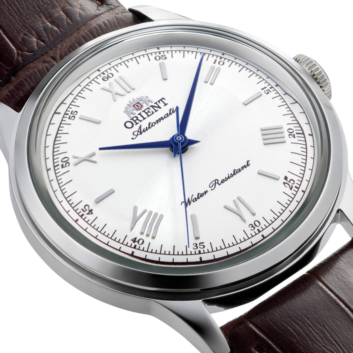 Close-up highlighting the white dial and polished stainless steel case of the Orient Bambino RA-BB0002S30B mens watch