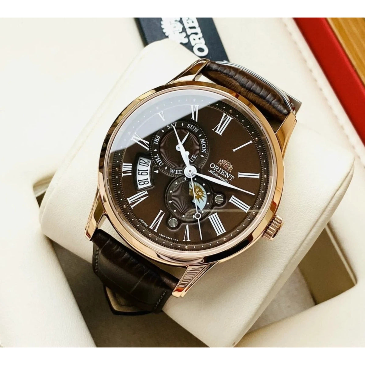 Brown dial Orient Bambino Sun and Moon automatic watch RA-AK0009T30B with brown leather strap and rose gold-tone case