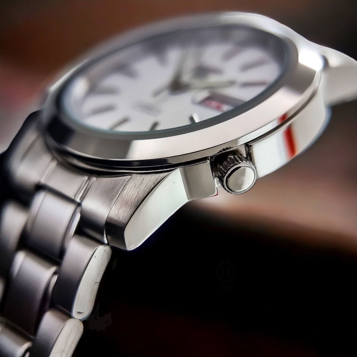 Seiko 5 Automatic SNKE49K1 side profile view highlighting crown placement and brushed steel case profile